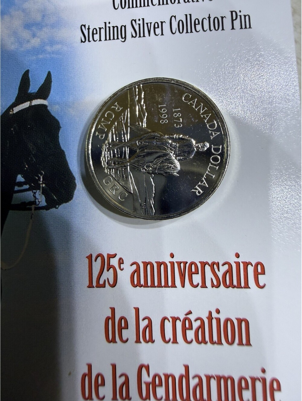 125th Anniversary Royal Canadian Mounted Police Silver Pin w/ 5 grams maple leaf